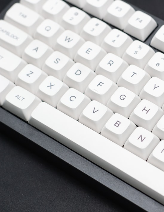 Mechanical keyboard with white keycaps.