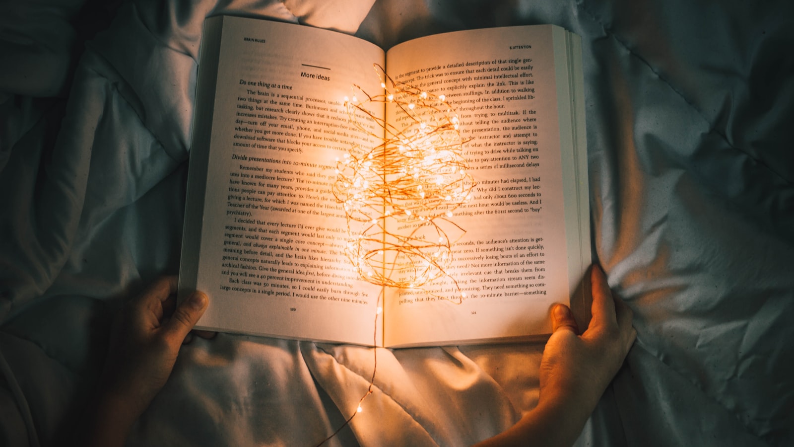 A picture of a book with lights in it. Who reads like this?
