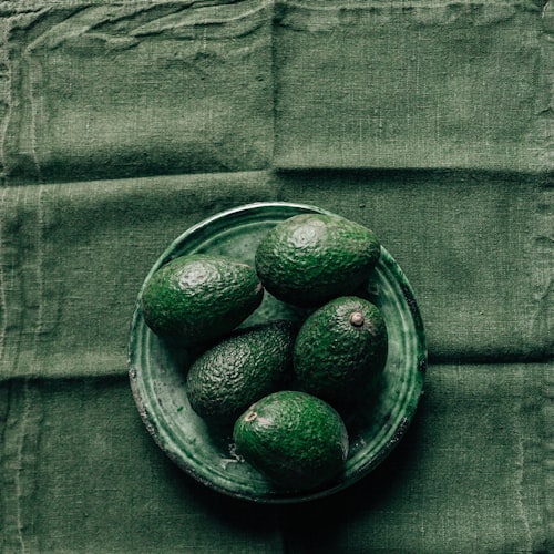 a bowl of avocados. 