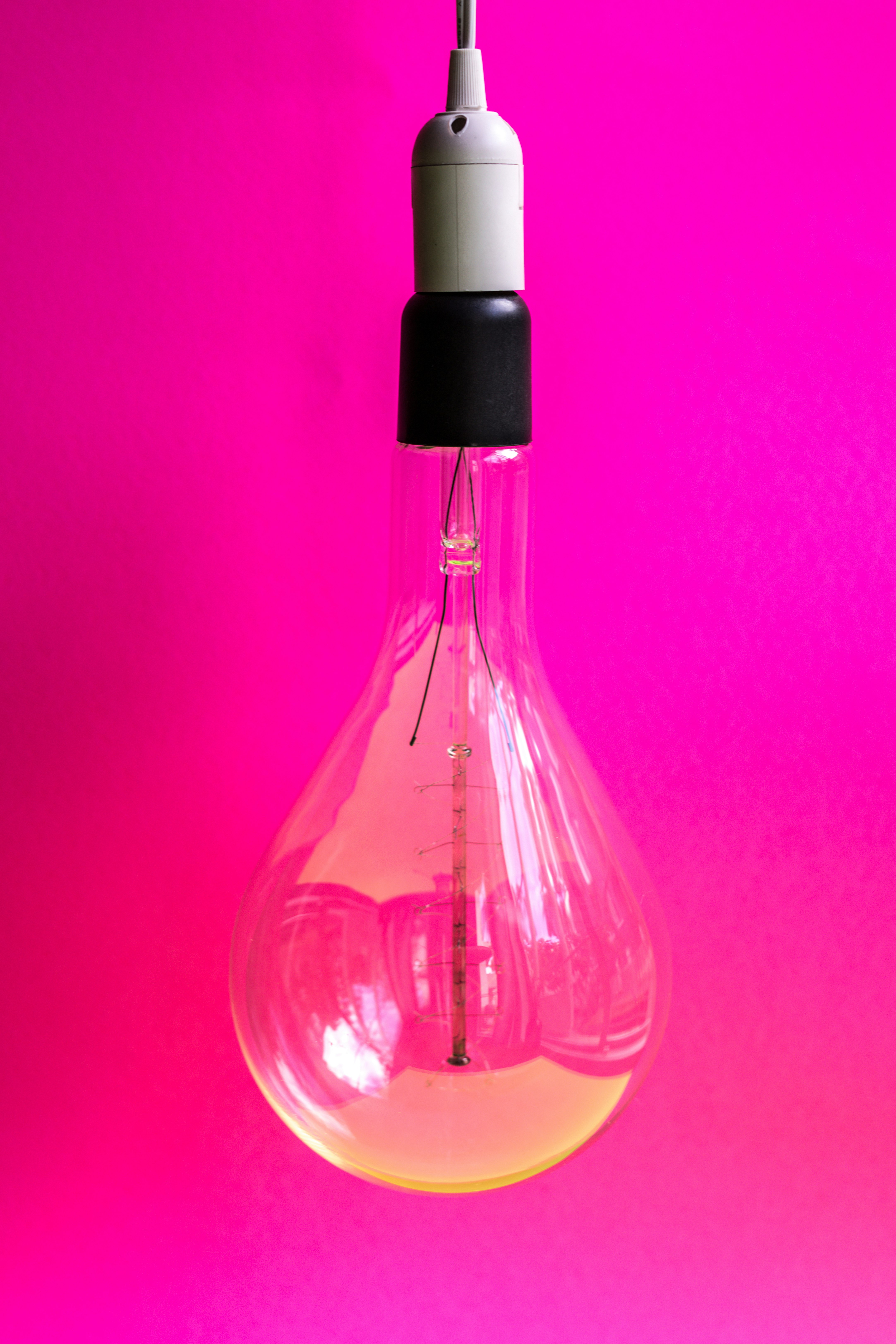 Suspended light bulb with unique filament 