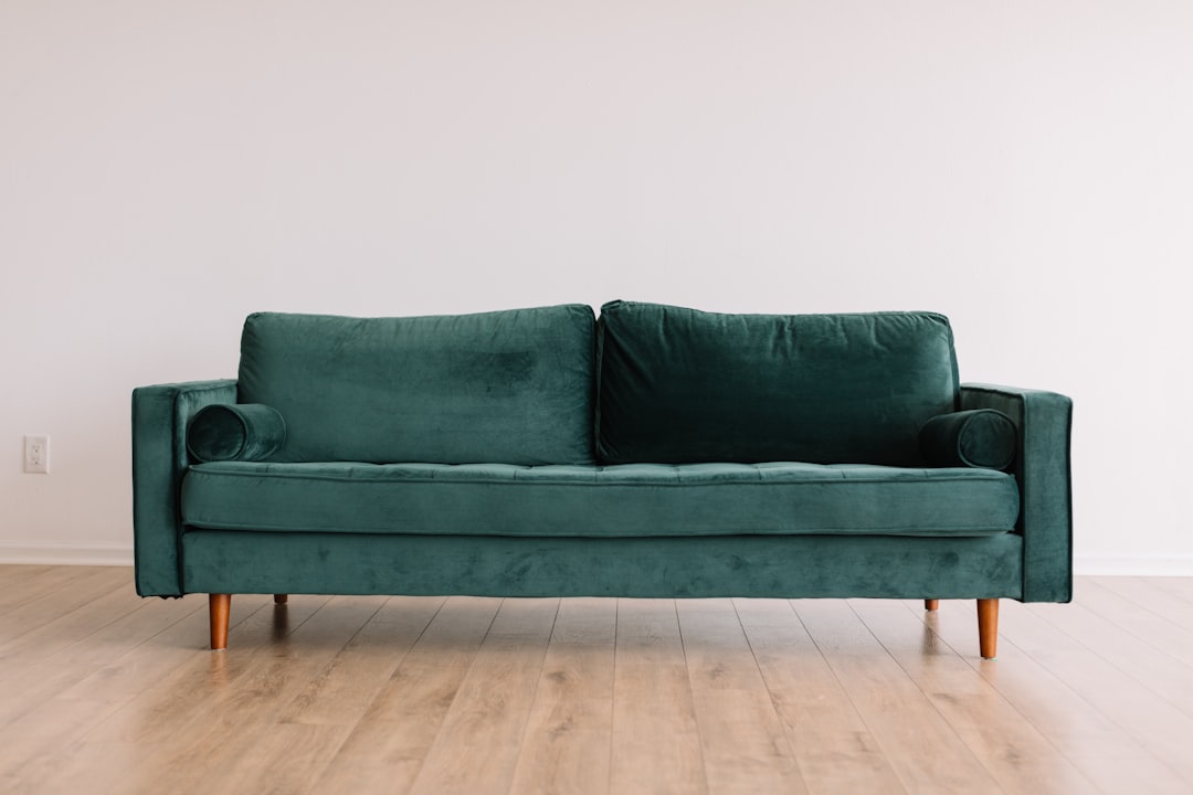 A comfortable green sofa in a therapist's office