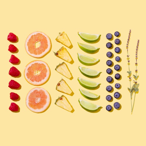 an arrangement of assorted sliced fruits. 