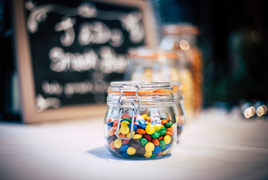 Sweets, jar, sign and table top HD photo by Clem Onojeghuo (@clemono2) on Unsplash