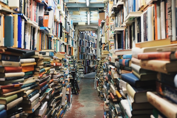 Alley of books by unsplash user @glennoble