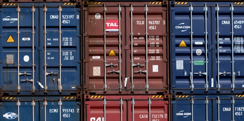 ENTREC's fleet includes semi-trucks for heavy haul transportation like the ones seen parked.