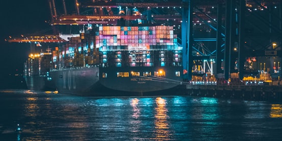 An ocean vessel is transporting thousands of shipping containers.