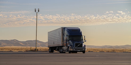 A Navistar International truck travels on a road, illustrating an article about a lawsuit over a data breach at the company.