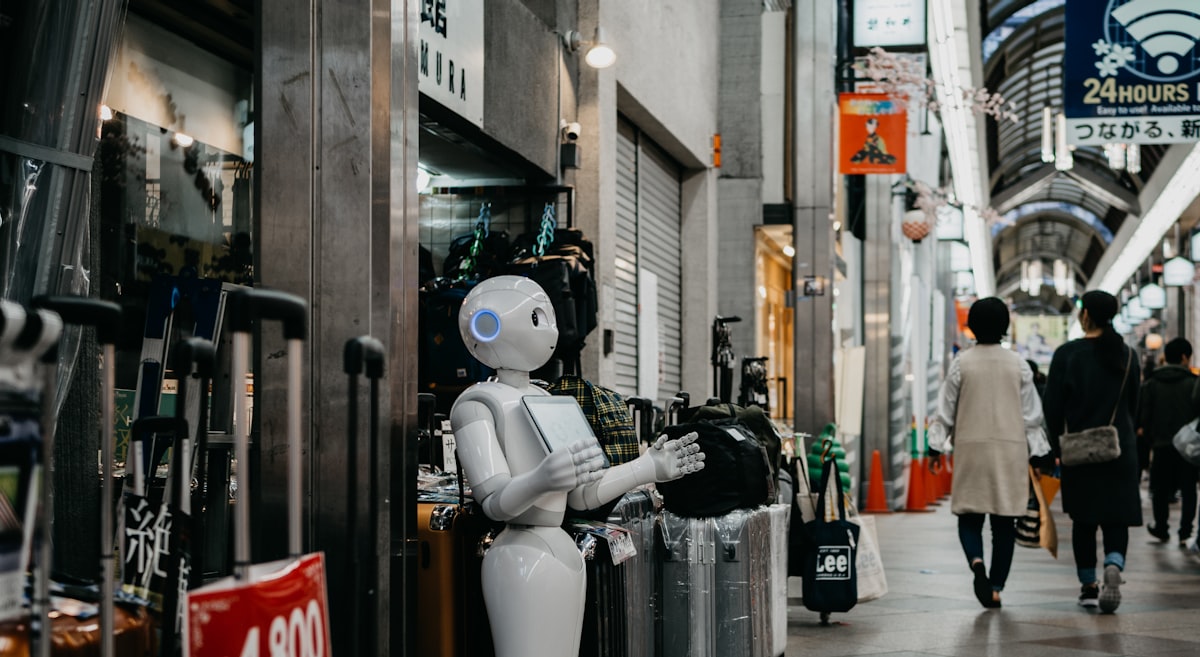 robot standing near luggage bags