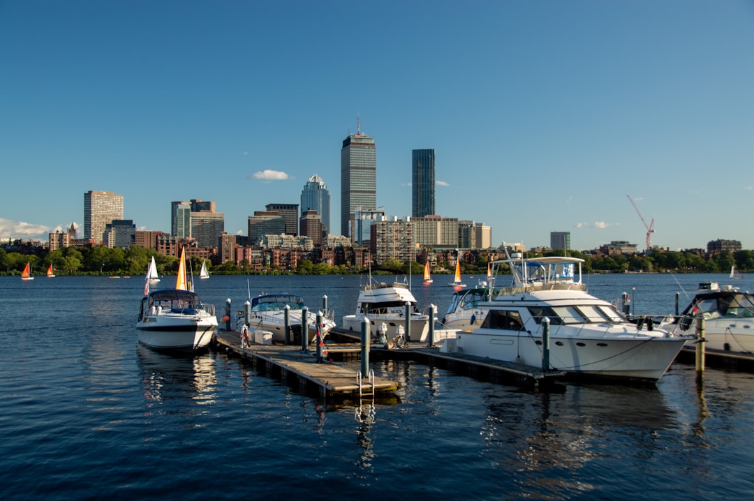 The Boston skyline with docked boats in the foreground