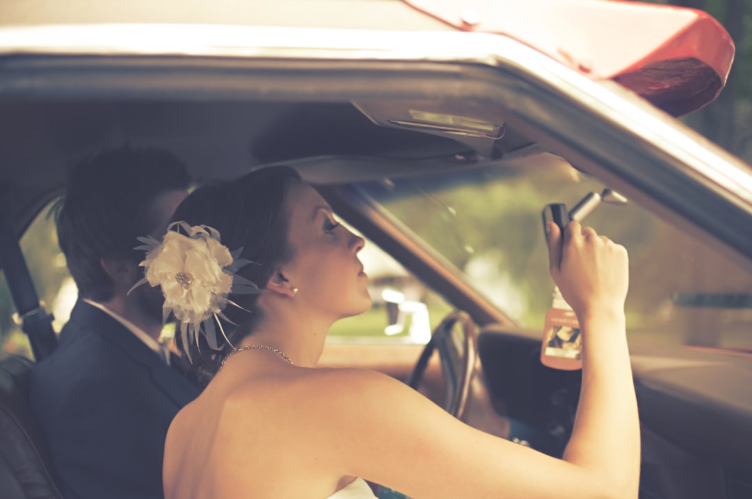 Wedding photography of bride and groom in car that has over 1 million views now